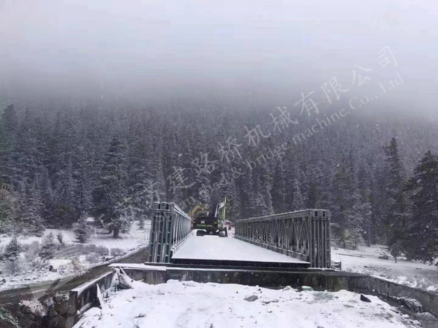 High strength steel bridge in snow covered mountain area for public infrastructure