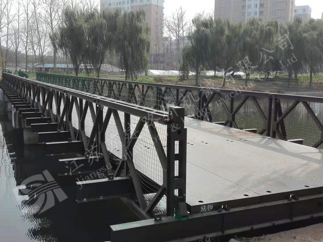 Prefabricated truss bridge deck improving waterfront passage in Suining urban area